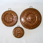 A very nice matching set of three solid copper vintage kitchen food molds from Sweden with embossed Dala horses and stylized hearts and flowers. The largest measures 7-1/4 inches diameter by 1-3/4&quo...