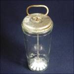 This cool old glass and metal mixing or beater jar has a patent number that dates to 1932. The glass jar was made by Hazel Atlas, the slotted bottom steel or tin plunger and lid unit are marked "...