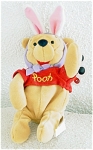 1998 Disneyland Mousketoys Easter Bunny Pooh 7 inch Mini Bean Bag. These were only available if one paid to go inside Disneyland theme park in Anaheim, California. Pooh is wearing his classic red Pooh...