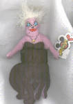 Disneyland Mousketoys Ursula bean bag from The Little Mermaid, has a Mousketoys tag.  This Bean bag plush character is between 7 and 8 inches tall. This evil female character has purple with white sti...