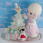 Precious Moments, Inc. c. 2006 The Art of Disney porcelain bisque figurine, 'When You Wish Upon a Star', No. 690010D, is 6 inches tall. This figurine depicts a blonde Precious Moments Girl with brown ...