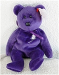 Ty, Inc. Princess the retired plush deep Purple Bear Beanie Baby with a White Rose motif on her chest, No. 4300, which honored Princess Diana after her death. She was manufactured and sold in 1997. Th...