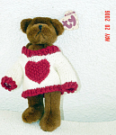 Ty Casanova, No. 6073, Attic Treasure Small is 7-8 inches tall standing plush brown teddy bear has jointed arms, legs, and head. Casanova is wearing a knitted white sweater with red knitted edging and...