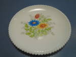 7.5 in. vintage salad plates from Westmoreland in the beaded edge floral milk glass pattern. These are from 1940-1975. They are used and mint. Each item is the listed price. 