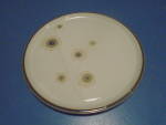 A beautiful 13.25 in. round platter or chop plate from Denby in the Smokestone Bloom pattern. <BR> It is in mint condition. A great find and addition to your set! 