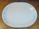 An oval platter from Corelle in the First of Spring pattern. The size is 12 x 10 in. Used but like new. 
