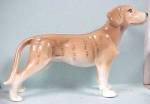 Brindle Dog with a Beagle Type Body. 4 1/2" high.  Unmarked, 1960s Japan pottery, excellent condition.
