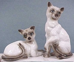 Homco Siamese Cat Pair, sitter is 7" high.  No damage, a little sloppy on the color & glaze.