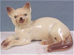 Lying Siamese Cat, 2 1/2" high.  Green "Japan" ink stamp, excellent condition.