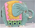 1960s Blue Elephant Bank, 5 1/4" high.  Light paper mache type ceramic.  Excellent condition with original rubber plug.