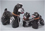1950s Japan Redware Black Poodle Dog & Pups, ma 3 1/4" high.  Papar "Japan" sticker, one pup has a 1/4" chip on muzzle & 2 tiny glaze chips glaze.  Mom & other pup are excellent. <...