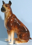 1960s Japan Ceramic Sitting Boxer Dog, 4 1/4" high.  Minor glaze flaws, otherwise excellent condition. 