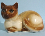 1950s Japan Pottery Lying Siamese, 1 7/8" high x 2 3/4" long.  Copy of a Keeler design, excellent condition. 