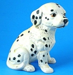 UCTCI Ceramic Dalmatian Puppy, 3 1/2" high.  Yellowed, otherwise excellent condition. 