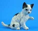 Miniature Bone China Cat, nylon whiskers, 1 3/4" high, excellent condition. 