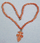 Carved Bone Bead and Leaf Necklace, 24" long, 2 1/2" leaf, excellent condition. 
