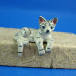 Klima K0241 Tabby Cat Edge Sitter, about 1" high.  Perfect for lying on a 1:12 scale dollhouse dining chair.  New porcelain miniature. 