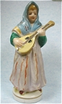 1940s/1950s Japan Ceramic Lady with a Lute, 5 3/4" high.  Marked with an "A" in a diamond, excellent condition. 
