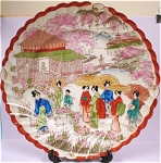 1930s-1950s Oriental Japan Plate, 8 1/2" across.  Low quality, sloppy paint.  Design decal miss line running down plate, no damage.  
