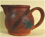 1950s/1960s Japan Redware Pitcher, 3 1/8" high.  Gloss inside, bisque outside, excellent condition. 