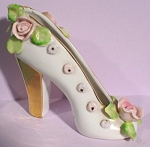 Nikoniko China Japan Pump Shoe with Roses, 3 5/8" high.  Tip missing on the bottom leaf, no other chips or damage. 