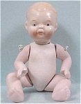 1940s/1950s Japan Bisque Baby Doll, 5" high.  Arm elastic need to be tightened, otherwise excellent condition.
