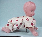 1950s/1960s Japan Windup Crawling Baby, about 3 1/2" high.  Works, light play wear & soiling, but, no damage.