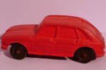 Red Rubber Toy Car Renault, West Germany, 3 1/2" long x 1 1/2" high.  Light edge wear, one axle bent, but, wheels turn freely. Black mark on side in picture washed off. 