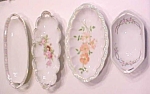 Offering these lovely vintage oblong celery dishes / bowls including, one ten inch long creamy white w/ a band of pink roses around the rim, pretty open handles; marked KPM Made in Germany (Carl Krist...