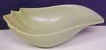 This is a rare shell patern gravy shaped bowl, in a rare medium green color. It is marked "ROSEVILLE U.S.A. 529-9" on the bottom. We see no chips or cracks, a few original minor matte finish...