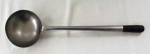 This is a nice clean hand formed ladle that appears to be pewter as it doesn't rust or stain as it is very clean. The handle is wood and fitted into a socket end. A very attractive early kitchen tool....