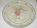 This 12 1/8" wide plate is in very nice, clean condition with no chips, cracks or silver marks. Very light utensil scratches in the pattern.<BR><BR>The pattern consists of geese tying a blue ribb...