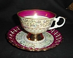 This is a Japan Luster Cup and Saucer Set. The cup measures 2.5" tall and is 3.75" in diameter. Good condition, no chips or nicks.