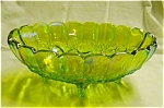 This is a Indiana Glass Green Carnival Fruit Bowl. It measures 12.5" long and is 8.5" wide. Good condition, no chips or nicks.
