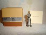 This is a Hallmark Little Gallery "The Little Caroler" Pewter Figurine. It measures 1.75" tall and is dated 1979. Still in box.