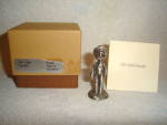 This is a Hallmark Little Gallery "The Little Caroler" Pewter Figurine. It measures 1.75" tall.Still in box,Box has Some Damage.The Pewter Figurine has no Damage.