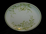 Lovely oval platter made by Franciscan China in the Greenhouse pattern. This platter is earthenware with green vine design. Its measurements are 14" x 11 1/4" It is in mint condition. 