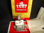 This is a Hallmark Peanuts Gallery Snoopy "Flying High". Figurine is still new in the box.  