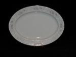 Camelot China Platter in the Carrousel Pattern #1315 This platter has a  Gray/Blue floral & scroll with a platinum rim. Platter measures 14 1/4" x 10 1/2 in good condition w/no nicks or chips.