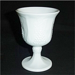 This is an Indiana Glass Milk Glass Goblet. It measures 5.25" tall and is in good condition, no chips or nicks.