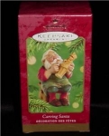 2001 Carving Santa Hallamrk Ornament. This ornament is still in the box. FREE SHIPPING WITHIN USA!!!!