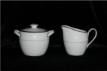 This is a sugar and creamer set made by Ashcraft Fine China, Japan. It is in good condition, no chips or nicks.