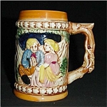 This is a Beer Stein Made in Japan. it measures 5" tall and 2.75" in diameter. Good condition, no chips or nicks.