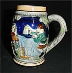 This is a Beer Stein Made in Japan. it measures 5.25" tall and is 2.5" in diameter. Good condition, no chips or nicks.