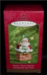 2001 Santa's Sweet Surprise Hallmark Ornament. Still in the box. FREE SHIPPING WITHIN USA!!!! 