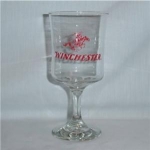 This is a glass advertising Winchester guns. It measures 6 1/2" tall. Good condition, no chips or nicks.