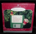 Hallmark 1998 "Checking Santa's Files" Christmas Ornament. Very cute ornament. Mint in box. FREE SHIPPING WITHIN USA!!!
