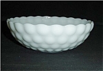 This is an Anchor Hocking Milk Glass Bubble Bowl. It measures 2.75" tall and is 8 3/8" in diameter. Good condition, no chips or nicks.