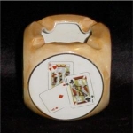 This is an ashtray in the shape of a die. It is made in Japan and is in good condition