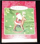 2001 Rocking Reindeer Hallmark Ornament. Still in the box. FREE SHIPPING WITHIN USA!!!!   